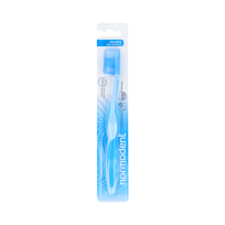 Normodent cepillo dental...